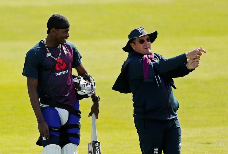 England head coach Trevor Bayliss gives bowler Jofra Archer batting tips. Reuters