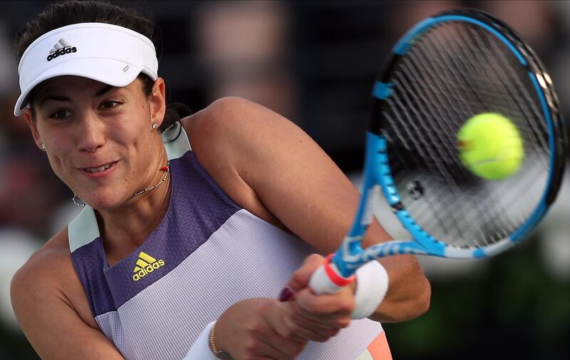 epa08227904 Garbine Muguruza of Spain in action during her second round match against Veronika Kudermetova of Russia at the Dubai Duty Free Tennis WTA Championships 2020 in Dubai, United Arab Emirates, 19 February 2020.  EPA/ALI HAIDER