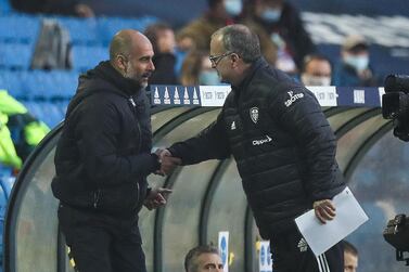 Manchester Cuty manager Pep Guardiola and Leeds coach Marcelo Bielsa at their October meeting. Getty