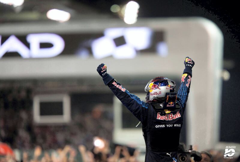 Standing atop his Red Bull car Sebastian Vettel salutes the crowd after winning the inaugural Abu Dhabi Grand Prix in 2009.  It set him up perfectly for the drivers' championship a year later.
