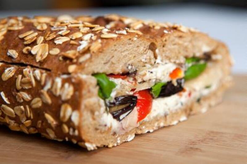 UAE - Dubai - May 02- 2011:  Picnic loaf sandwich, cream cheese, basil marinated vegetables.  ( Jaime Puebla - The National Newspaper )