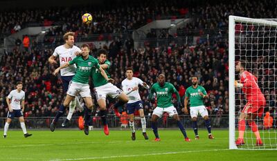 Soccer Football - Premier League - Tottenham Hotspur vs West Bromwich Albion - Wembley Stadium, London, Britain - November 25, 2017   Tottenham's Harry Kane heads at goal as he is in action with West Bromwich Albion’s Ahmed Hegazi and Jonny Evans            REUTERS/Hannah McKay    EDITORIAL USE ONLY. No use with unauthorized audio, video, data, fixture lists, club/league logos or "live" services. Online in-match use limited to 75 images, no video emulation. No use in betting, games or single club/league/player publications. Please contact your account representative for further details.?