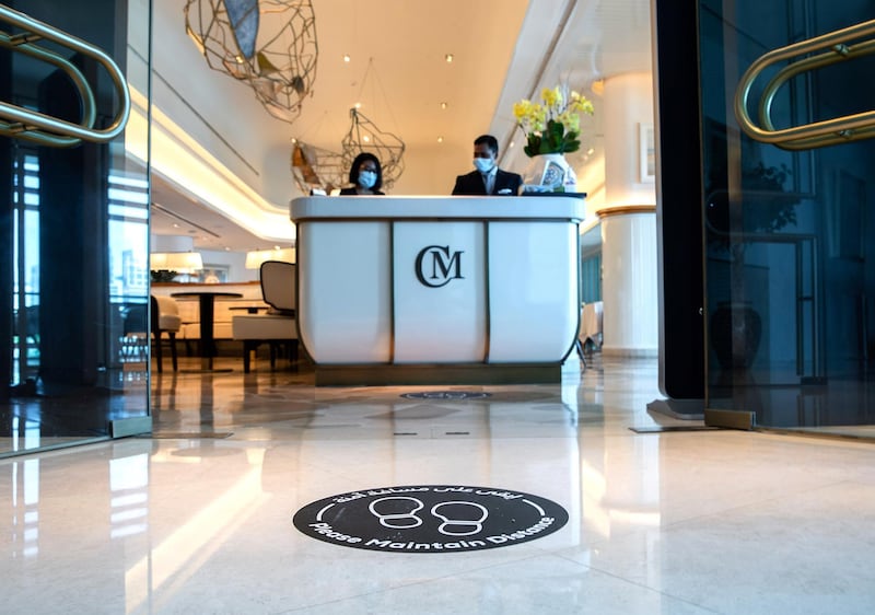 Abu Dhabi, United Arab Emirates, June 15, 2020.   
 Social distancing floor signs at the reception of the Cafe Milano at the Four Seasons Hotel, Abu Dhabi.
Victor Besa  / The National
Section:  If
Reporter:  Janice Rodrigues