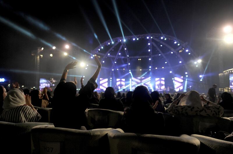 Saudi women attend a concert by Egyptian pop sensation Tamer Hosny in the western city of Jeddah. Amer Hilabi / AFP