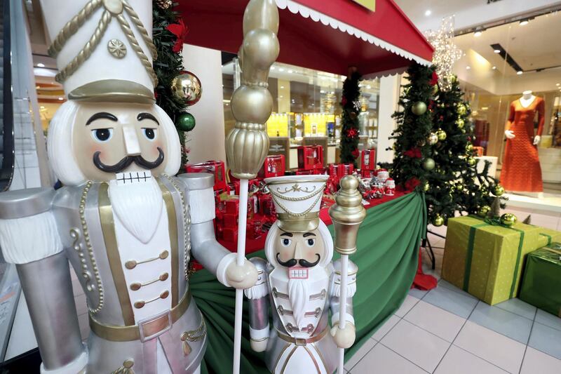 Dubai, United Arab Emirates - December 21st, 2017: Visitors at the Christmas lights at Wafi Mall. Thursday, December 21st, 2017 at Wafi Mall, Dubai. Chris Whiteoak / The National