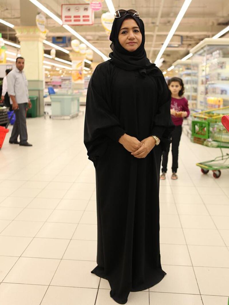 13-June-2012, Al Khalideya Mall, Lulu Super Market, Abu Dhabi

Dalal Abdulla, local Emirate who is with  set up new rule for the dress code for the foreign tourist and visitors who are going to public places with not wearing proper cloth. Fatima Al Marzooqi/ The National. 



