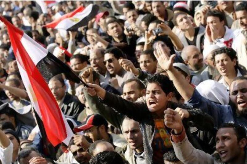 Thousands of demonstrators take part in anti-government protest in Tahrir Square in Cairo as they dug in for their third week of demonstrations.