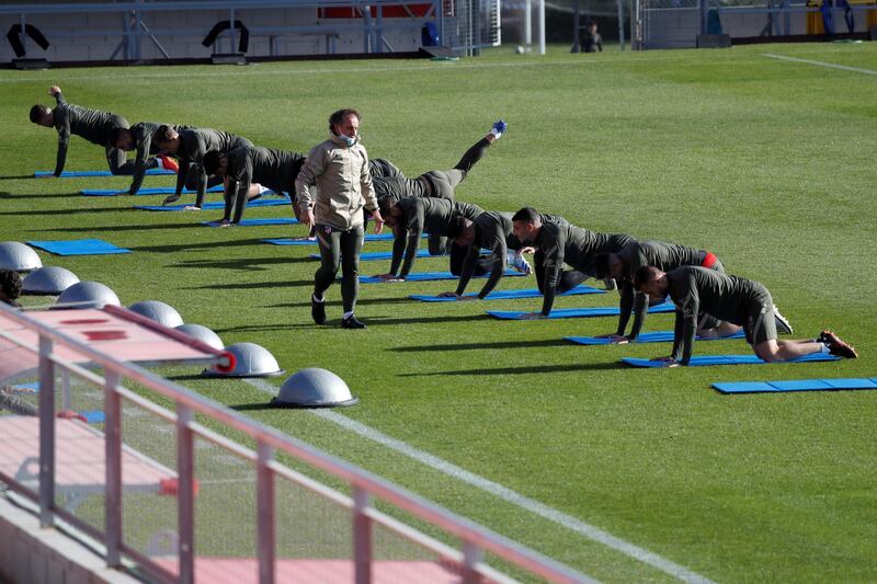 Atletico Madrid's physical trainer Oscar Ortega during a training session. EPA