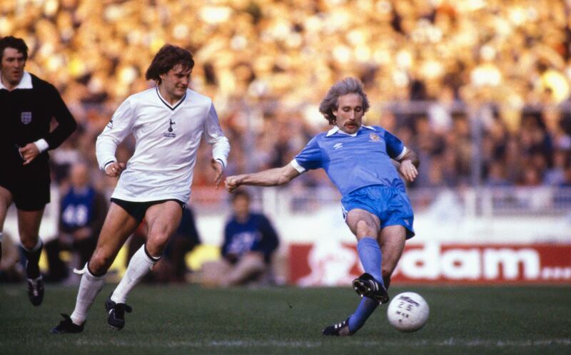 LONDON, UNITED KINGDOM - MAY 14: Manchester City player Gerry Gow (r) holds off Spurs player Glenn Hoddle during the 1981 FA Cup Final Replay between Tottenham Hotspur and Manchester City at Wembley Stadium on May 14, 1981  (Photo by Duncan Raban/Allsport/Getty Images)