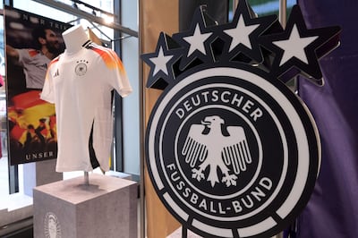 Germany's national team jerseys made by Adidas are pictured in official store on March 22, 2024 in Frankfurt. AFP