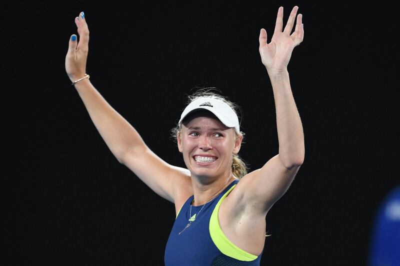 epa06477941 Caroline Wozniacki of Denmark celebrates winning the women's singles final match against Simona Halep of Romania at the Australian Open tennis tournament in Melbourne, Australia, 27 January 2018.  EPA/LUKAS COCH AUSTRALIA AND NEW ZEALAND OUT