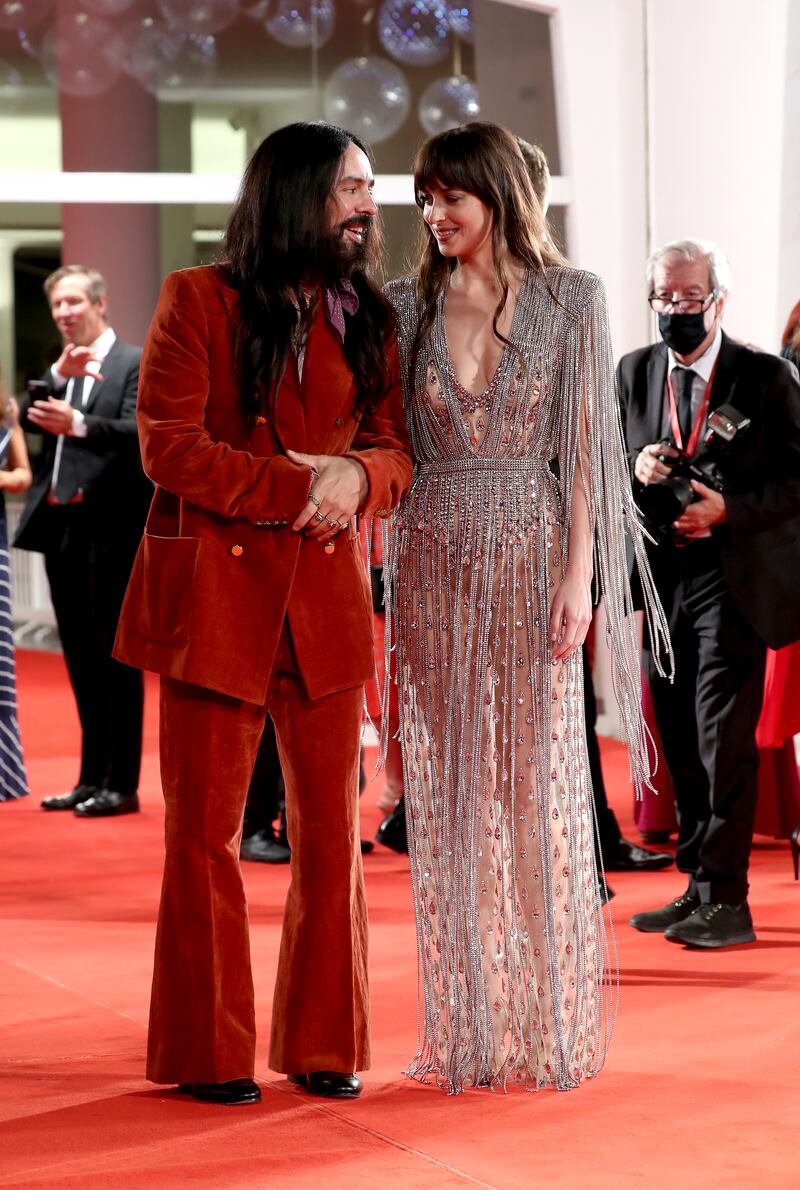 Michele and actress Dakota Johnson at the Venice International Film Festival in 2021. Getty Images