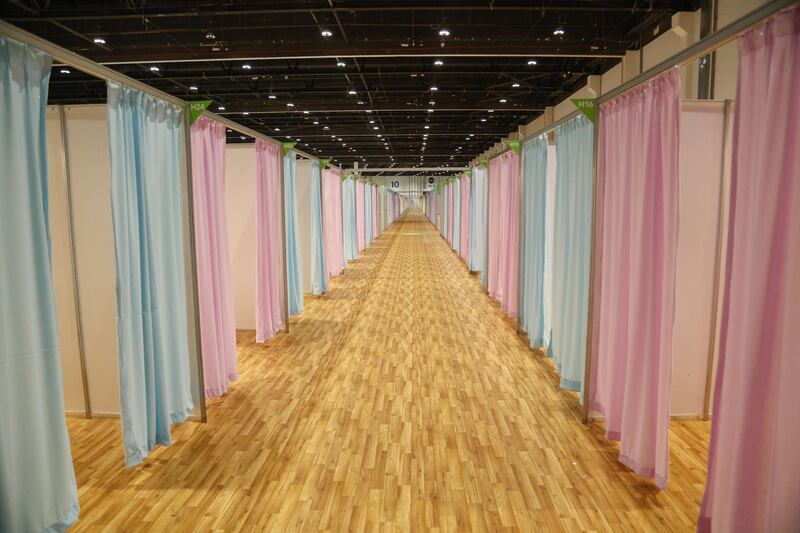Partitioned cubicles have been set up at the Adnec venue