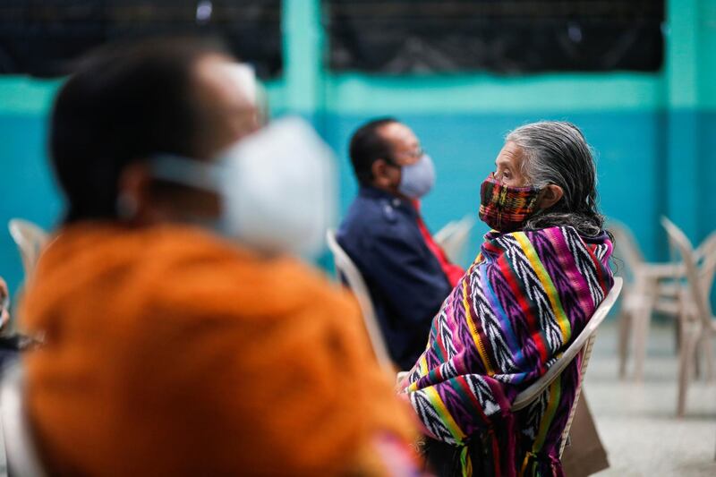 Indigenous Mayan people wait their turn to receive the Oxford/AstraZeneca vaccine at the municipal hall in San Pedro Sacatepequez, Guatemala. Reuters
