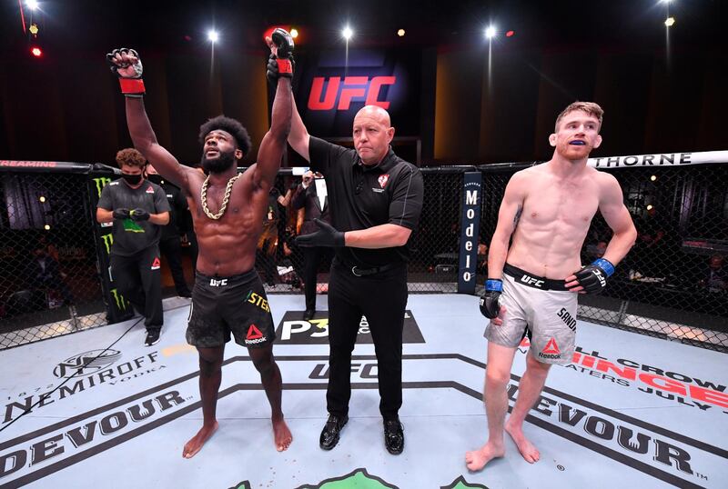 Aljamain Sterling celebrates after his submission victory over Cory Sandhagen. Reuters