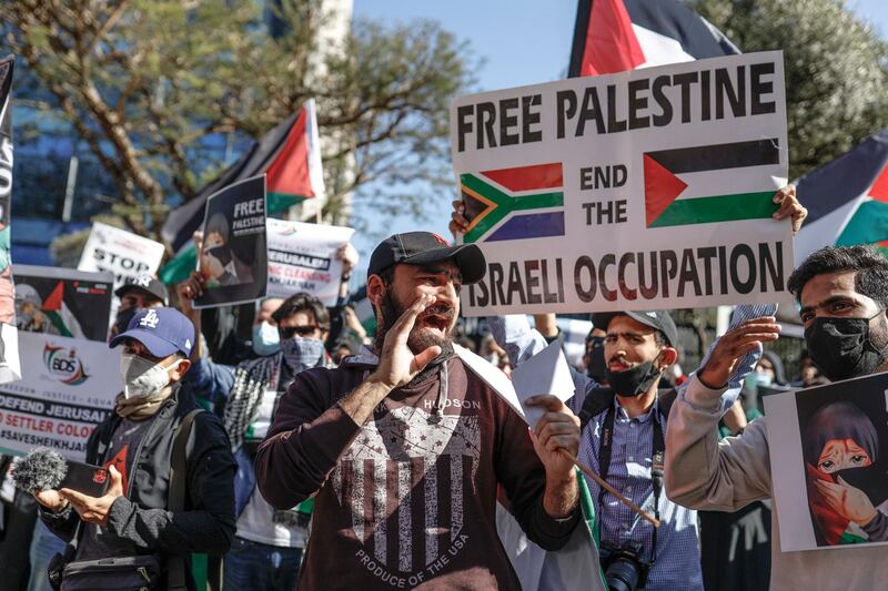 Demonstrators gather outside of the Israel Trade office in Sandton, Johannesburg, South Africa. AFP