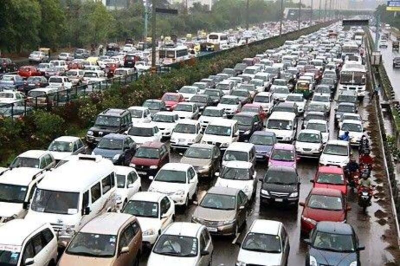 Consumers are postponing car purchases as worries about the economy increase. Traffic jams such as this in Delhin don't help either. AP Photo