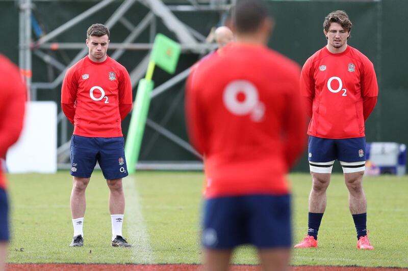 George Ford, Tom Curry, and the rest of the England rugby team participate in a silence in honour of Armistice Day during a training session in Teddington. Getty Images