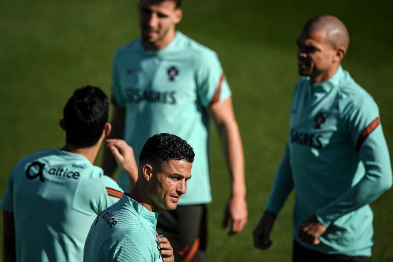 Portugal's Cristiano Ronaldo trains with teammates at the Cidade do Futebol training ground. AFP
