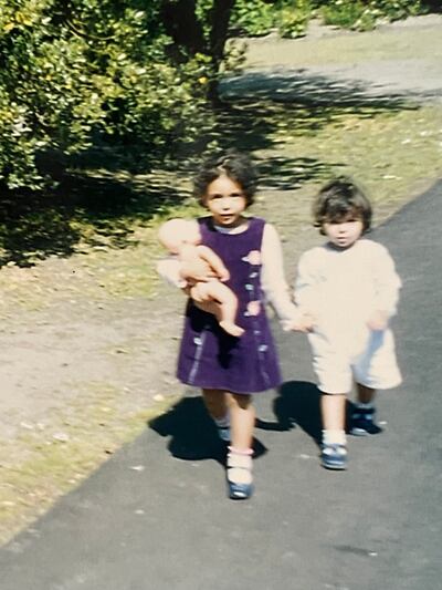 Nora Attal, above with younger sister Yesmin in Battersea Park, London, near the council estate they lived on, recalls being a shy, studious little girl. Photo: Nora Attal