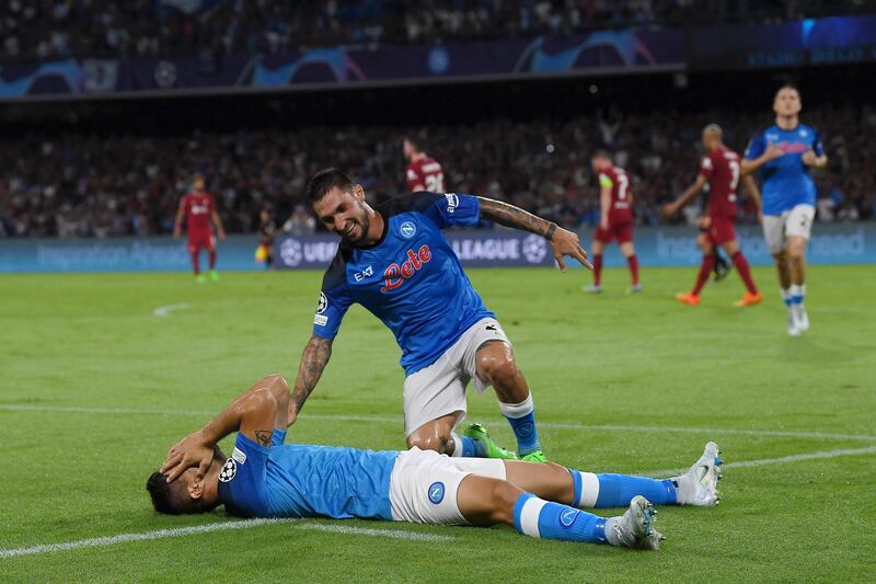 Giovanni Simeone celebrates with teammate Matteo Politano after scoring Napoli's third. Getty