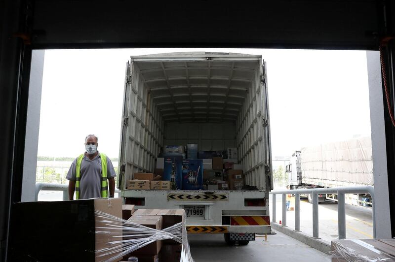 DUBAI, UNITED ARAB EMIRATES , March 18, 2021 –  View of the unloading area at the Amazon DXB3,  Amazon fulfilment centre  in Dubai Logistics City in Dubai. (Pawan Singh / The National) For Lifestyle/Online/Instagram. Story by Farah