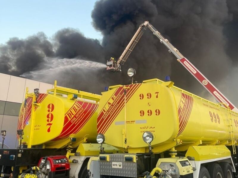 Firefighters tackle a blaze at a recycling warehouse in Al Quoz in November. Photo: Dubai Civil Defence