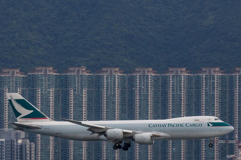 A Boeing Co. 747 cargo aircraft operated by Cathay Pacific Airways Ltd. prepares to land at Hong Kong International Airport in Hong Kong, China, on Sunday, Aug. 5, 2018. Just when Hong Kong’s flagship airline was showing signs of a rebound, crude oil played spoilsport again, denting early gains from a transformation plan that Chief Executive Officer Rupert Hogg considers crucial to survival. Photographer: Paul Yeung/Bloomberg