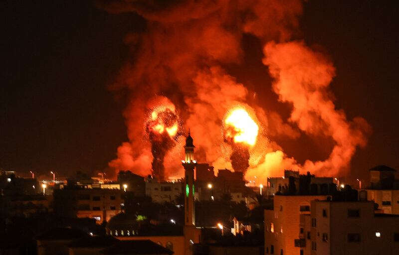Fires are seen following an Israeli airstrike in Gaza city. AFP