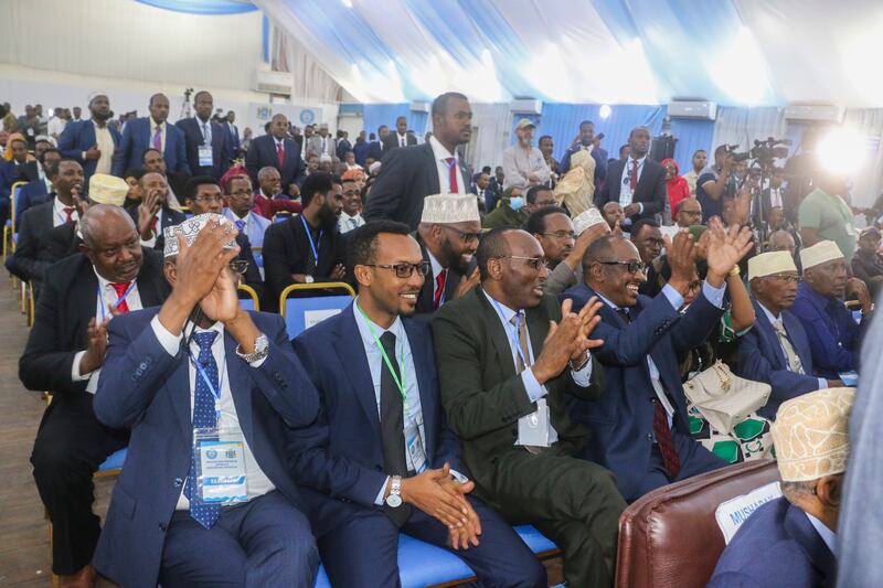 Somali MPs applaud as Hassan Sheikh Mohamud is sworn in as the new president. EPA