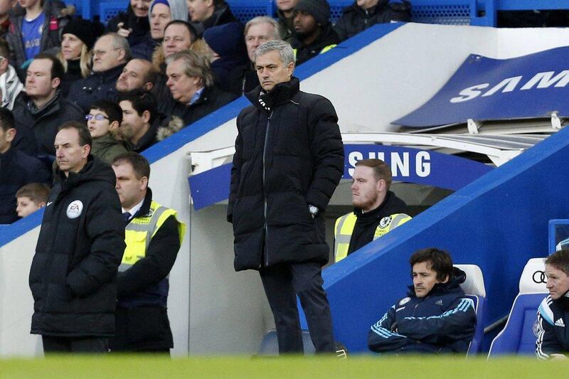 Jose Mourinho observes his side during their 4-2 loss to Bradford City in the FA Cup fourth round on Saturday. Justin Tallis / AFP / January 24, 2015