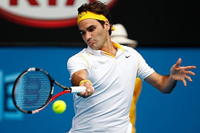 Roger Federer wasted no time in advancing to the second round of the Australian Open.