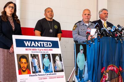 Authorities update the media on the search for Danelo Cavalcante on Tuesday, ahead of his capture. AP