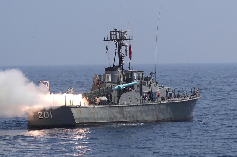 A missile being fired from an Iranian Navy warship during a navy military drill in the Gulf of Oman. Iranian Army/WANA via REUTERS