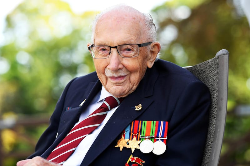 Captain Sir Tom Moore smiles as he launches his autobiography book 'Tomorrow will be a Good Day' at his home in Milton Keynes, Britain. Reuters