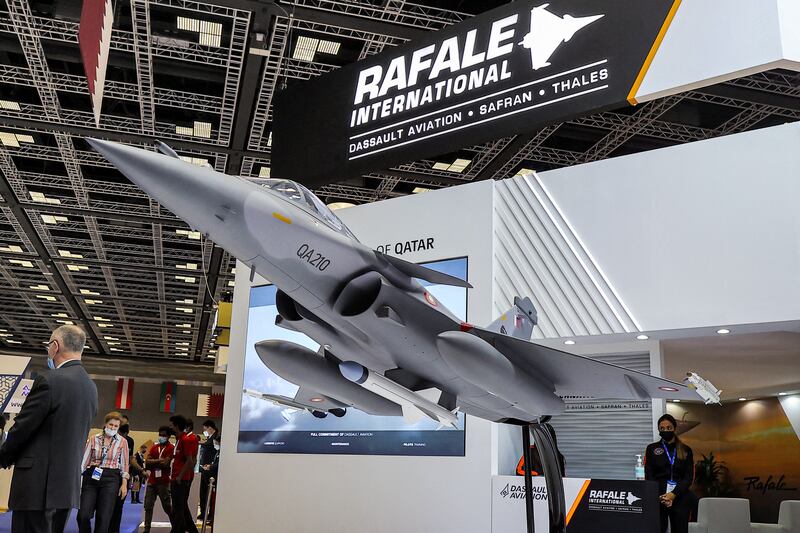 A one-fifth scale model of a Qatar Emiri Air Force French-made Dassault Rafale multi-role fighter aircraft at the Doha International Maritime Defence Exhibition in the Qatari capital.