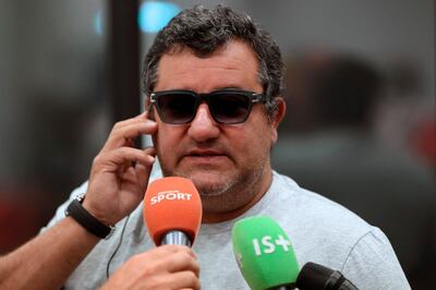 (FILES) In this file photo taken on September 2, 2016, Italian-born Dutch football agent Mino Raiola speaks to journalists during a presentation of Nice's football club new signings at the Allianz Riviera stadium in Nice, southeastern France.
Manchester City were offered the chance to sign Manchester United's Paul Pogba during the January transfer window, according to City manager Pep Guardiola. "I said no. We don't have the money to buy Pogba because he is so expensive," Guardiola told reporters on Friday as he attacked the conduct of agent Mino Raiola.
 / AFP PHOTO / VALERY HACHE