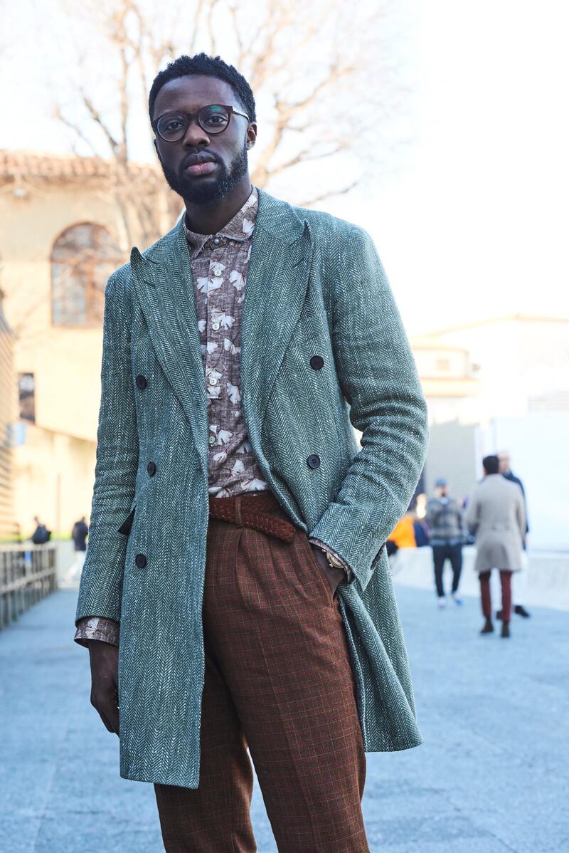 Take some cues from the street and runway stars of this year’s Pitti Uomo show in Florence, the ultimate signifier of what’s on-trend in menswear. This look shows tweed over florals over plaid – then finished with a handsome woven belt that accentuates the textures. This pattern-on-pattern-on-pattern look is modern dressing at its finest