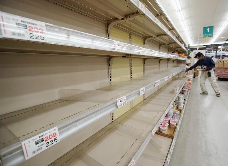 Empty shelves at a supermarket as people rushed to stock up in preparation for Typhoon Hagibis in Tateyama, Chiba Prefecture.  Kyodo via Reuters