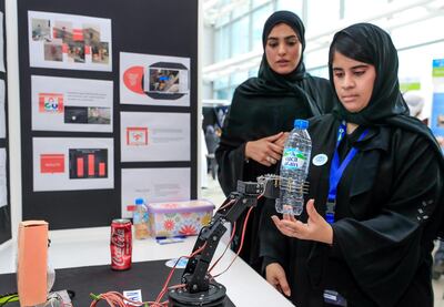 Abu Dhabi, United Arab Emirates, February 23, 2019.  Think Science Fair 2019 at Khalifa University. Hend AlSanadi demonstrates the Recycling Robot Arm.
Victor Besa/The National
Section:  NA
Reporter:  Shireena Al Nowais