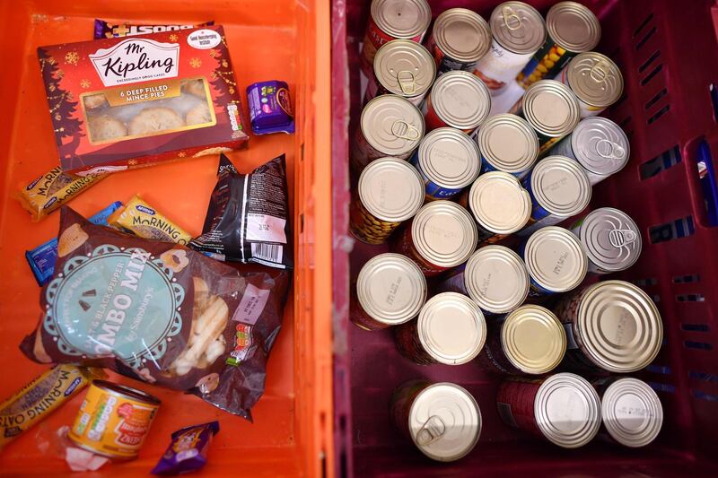 Donated food is seen at the Slough Baptist Church food bank in Slough, west of London, on November 28, 2019.  As record numbers of Britons flock to food banks and homelessness soars, for many people rampant poverty, not Brexit, is the main issue in next week's general election. - TO GO WITH AFP STORY BY ROLAND JACKSON
 / AFP / BEN STANSALL / TO GO WITH AFP STORY BY ROLAND JACKSON
