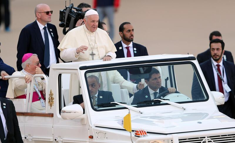 Pope Francis arrives to hold Mass at Zayed Sports City. Reuters