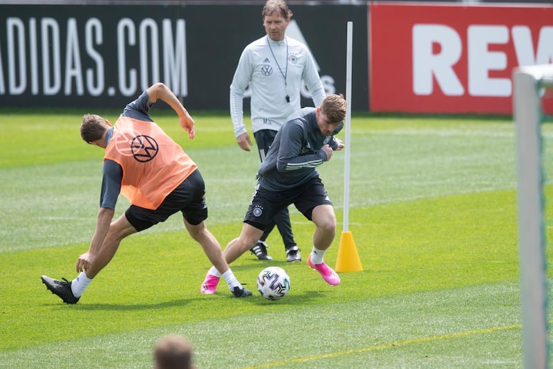 Thomas Muller (L) and  Timo Werner in action. Getty