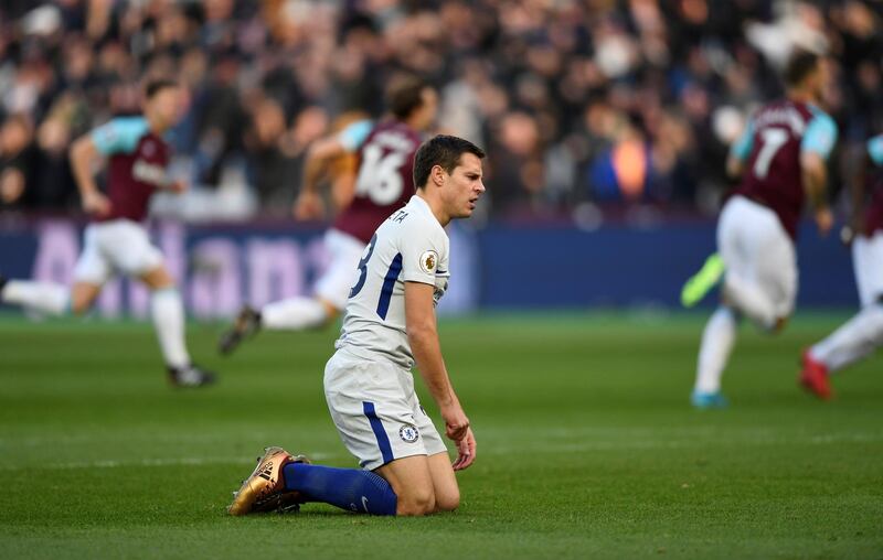 Soccer Football - Premier League - West Ham United vs Chelsea - London Stadium, London, Britain - December 9, 2017   Chelsea's Cesar Azpilicueta looks dejected after conceding the first goal   Action Images via Reuters/Tony O'Brien    EDITORIAL USE ONLY. No use with unauthorized audio, video, data, fixture lists, club/league logos or "live" services. Online in-match use limited to 75 images, no video emulation. No use in betting, games or single club/league/player publications. Please contact your account representative for further details.