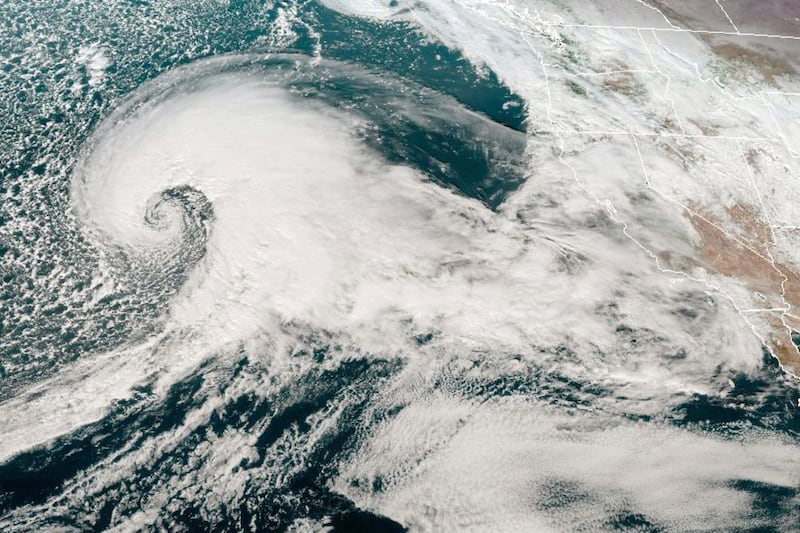 A satellite image of a storm system approaching the US West Coast. National Oceanic and Atmospheric Administration / AP