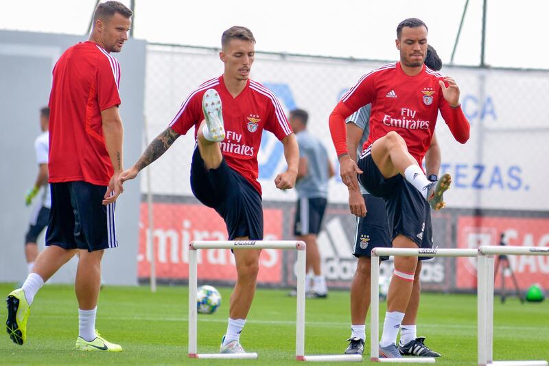 Benfica' players warm up during a training session ahead of their Champions League match against RB Leipzig. The German team ran out 2-1 winners. EPA