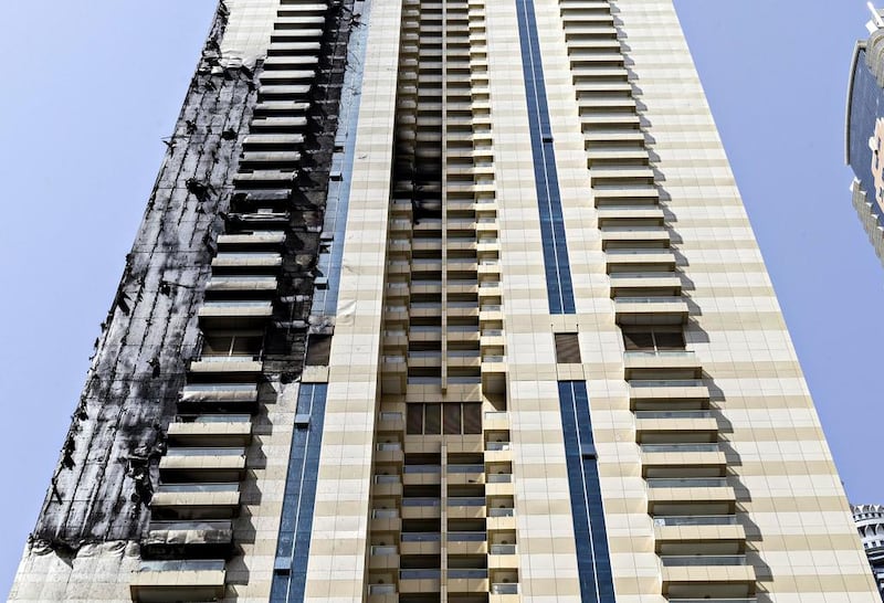 The Sulafa Tower building sustained significant damage in a fire that spread over several floors. Antonie Robertson / The National