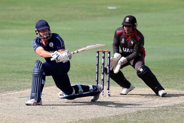 George Munsey produces one of his many reverse sweep shots for Scotland against the UAE at the T20 World Cup Qualifier. Chris Whiteoak / The National