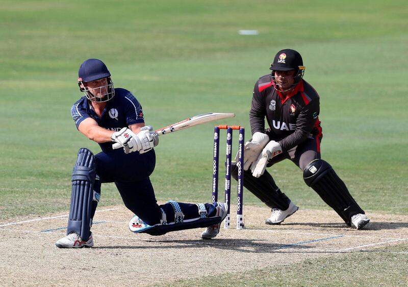 Dubai, United Arab Emirates - October 30, 2019: George Munsey of Scotland scores more runs during the game between the UAE and Scotland in the World Cup Qualifier in the Dubai International Cricket Stadium. Wednesday the 30th of October 2019. Sports City, Dubai. Chris Whiteoak / The National