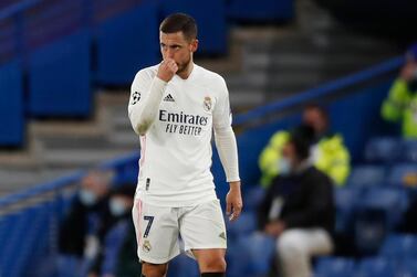 Real Madrid's Eden Hazard gestures after Chelsea's Mason Mount scored his side's second goal, during the Champions League semifinal 2nd leg soccer match between Chelsea and Real Madrid at Stamford Bridge in London, Wednesday, May 5, 2021. (AP Photo/Alastair Grant)